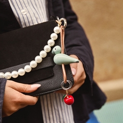 Kay Bojesen fugl sølvtonet metal nøglering med naturlæder i grøn