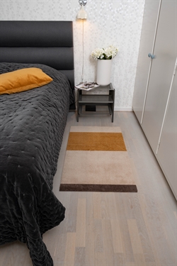 Måtte Stripes Horizon ivory/dijon/brun 67x120 cm fra Tica Copenhagen